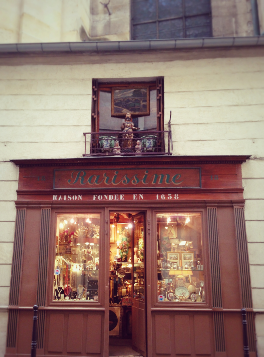 The Tiniest Antique Shop in Paris is stuck to the side of ...